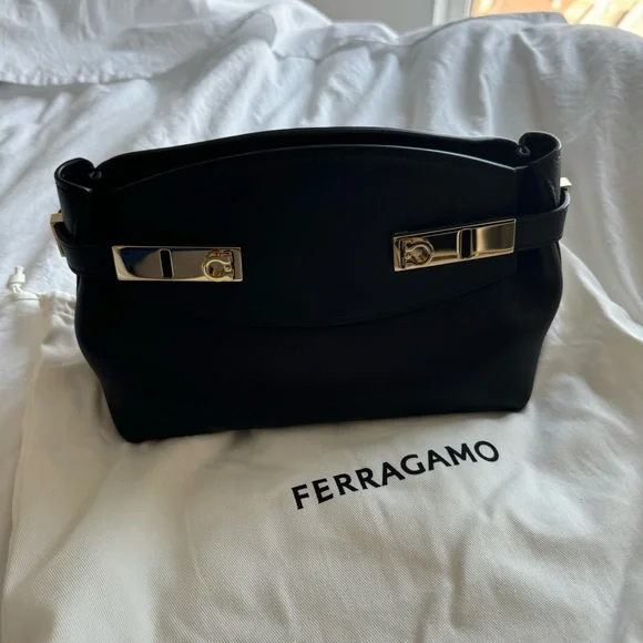 Ferragamo Hug Pouch bag in black and gold hardware - Picture 2 of 11